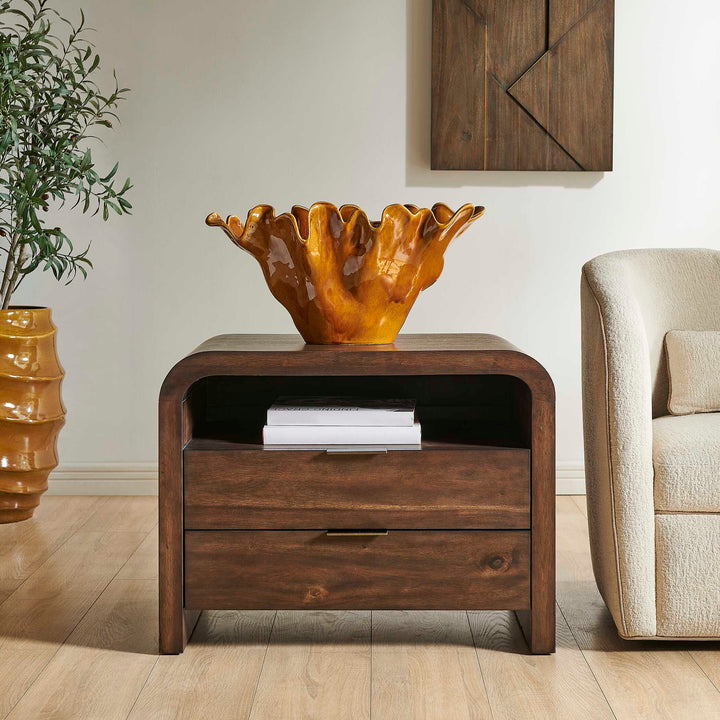 A dark brown wooden nightstand