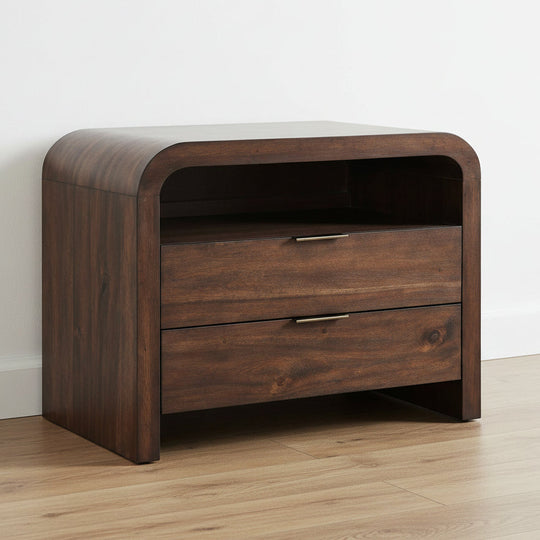 A modern two-drawer nightstand in dark brown wood with a curved top edge and slim bronze metal drawer pulls, shown on a plain white background.