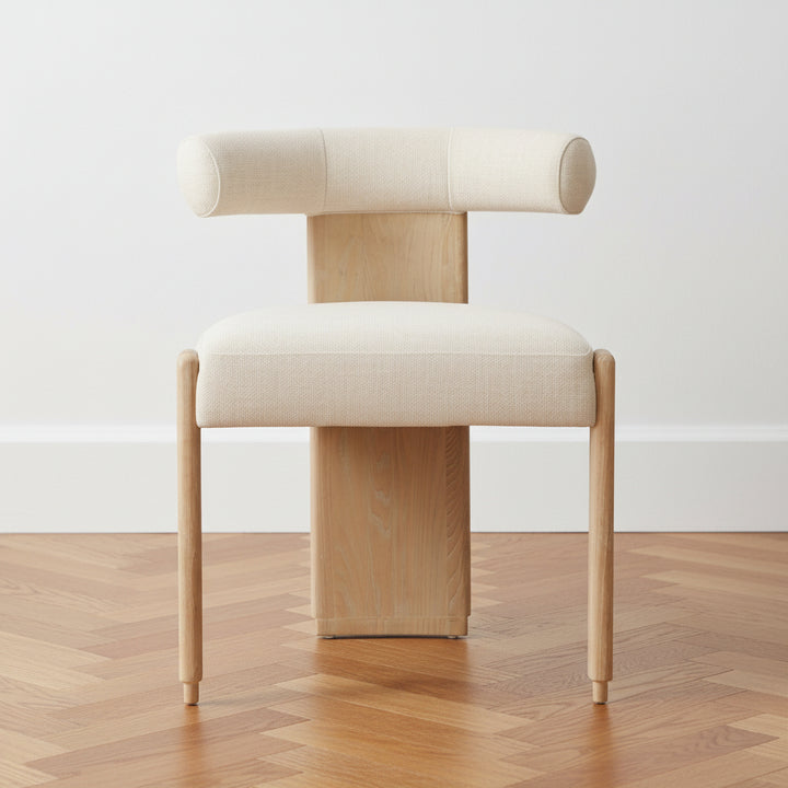 Beige chair with wooden legs