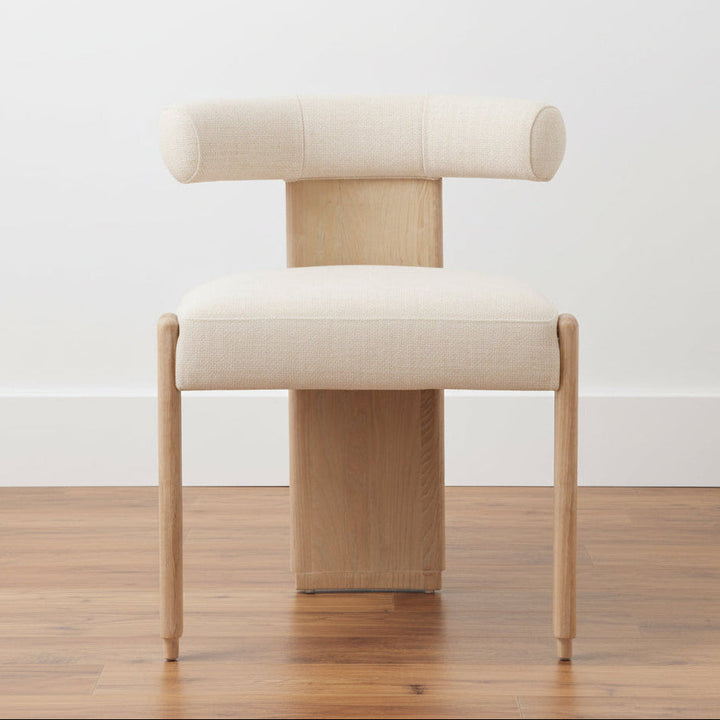 Chair with beige cushioned seat and backrest