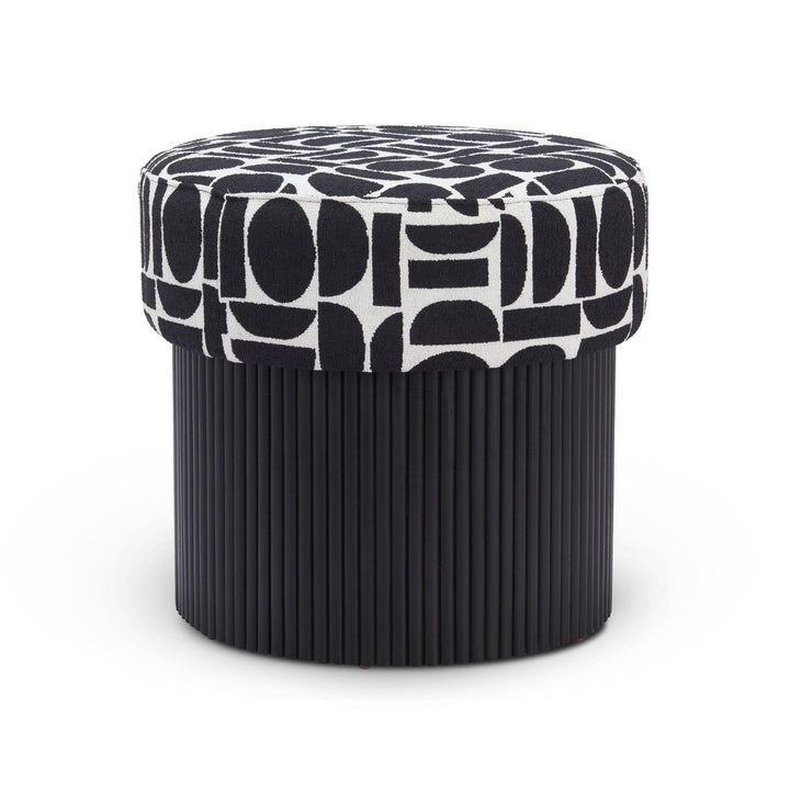 Black and white patterned ottoman on a white background