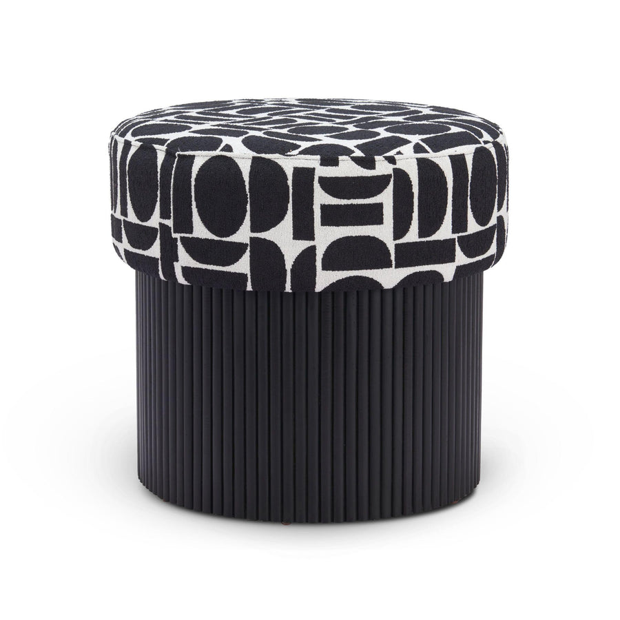 Black and white patterned ottoman on a white background