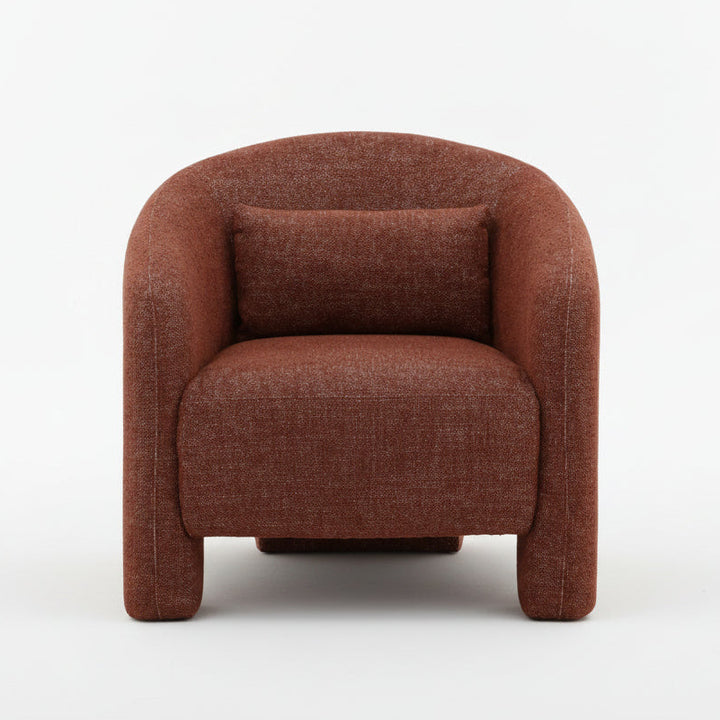 rust-colored armchair, rounded barrel shape, textured fabric upholstery