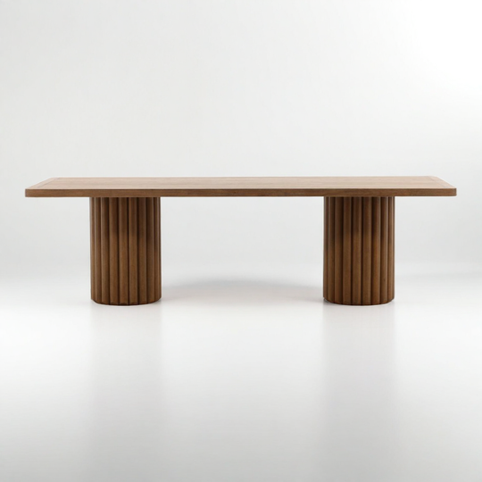 Wooden table with cylindrical legs on a white background
