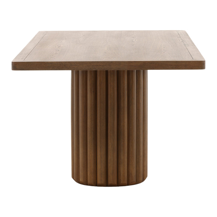 Wooden table with a textured surface and cylindrical base on a white background