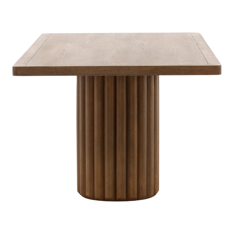 Wooden table with a textured surface and cylindrical base on a white background