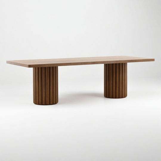 Wooden table with cylindrical base on a white background