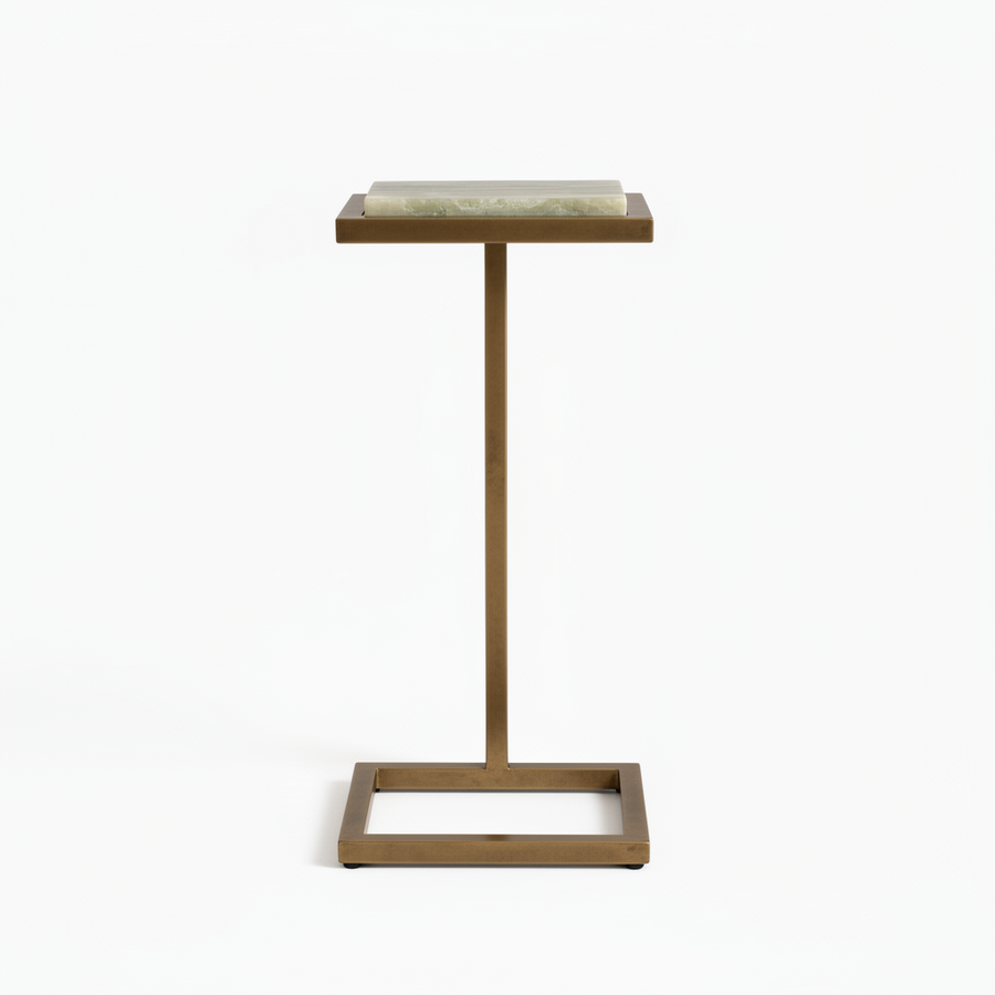 A modern T-style side table featuring a square brass-finished metal frame with a rectangular base and a flat top slab in a pale green marbled stone, shown on a plain white background.