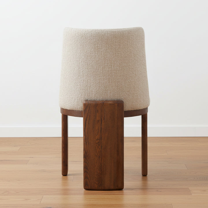 Chair with beige cushioned backrest
