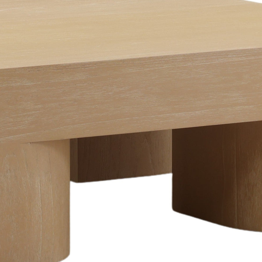 square coffee table in a light natural wood finish