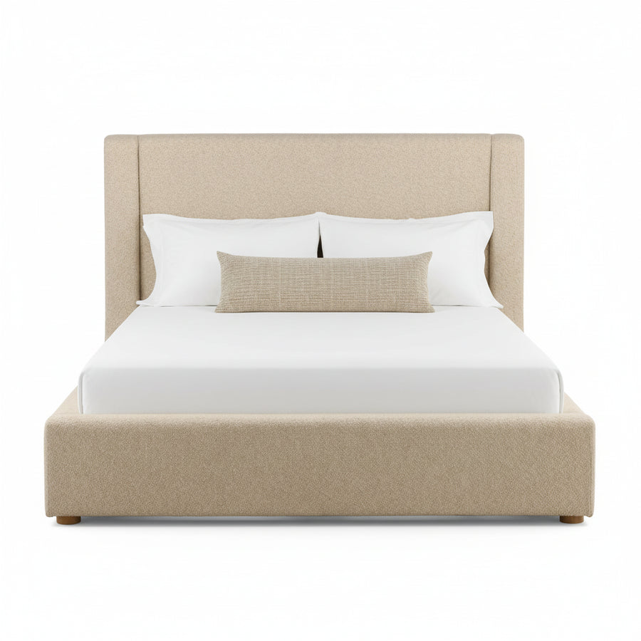 modern upholstered bed frame, white mattress, two standard pillows, one textured cylindrical bolster pillow