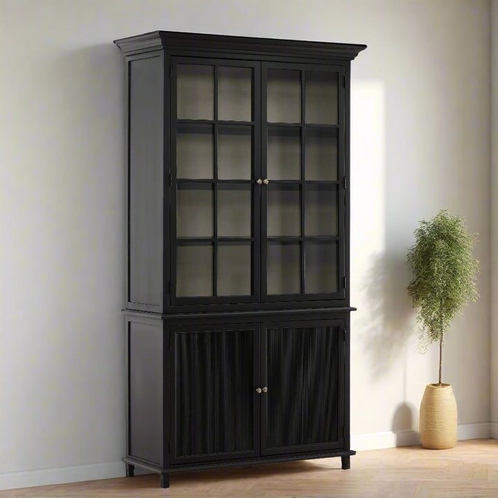 Black display cabinet with glass doors on a white background