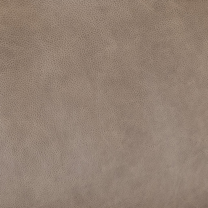 A close-up of a textured leather material in a warm taupe-brown color, showing a fine pebbled grain pattern.
