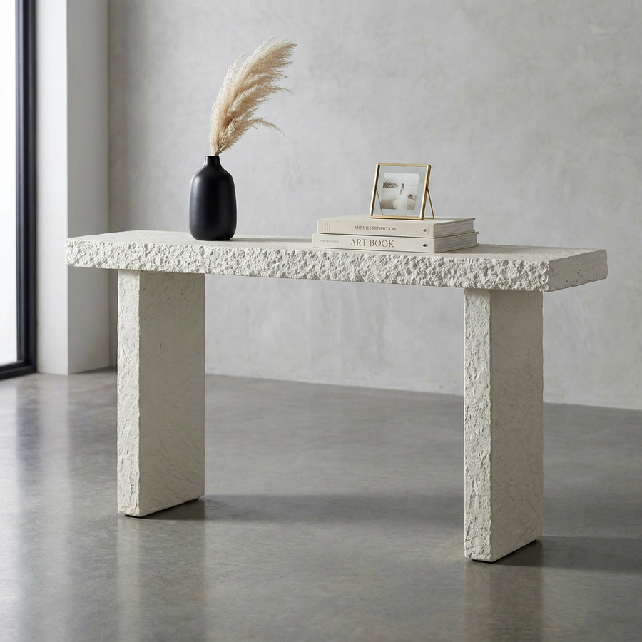 A textured off-white concrete console table