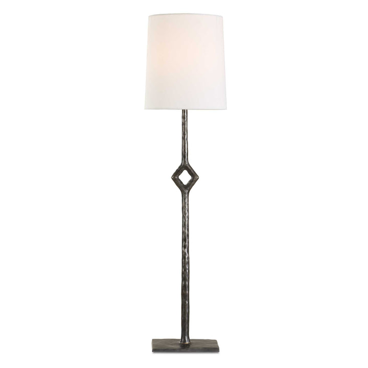 Floor lamp with a white shade on a white background
