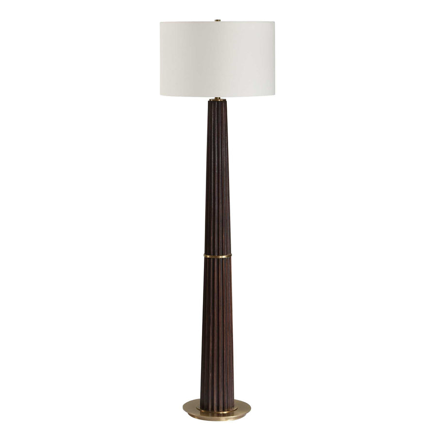 Floor lamp with a dark brown cylindrical base and white shade on a white background