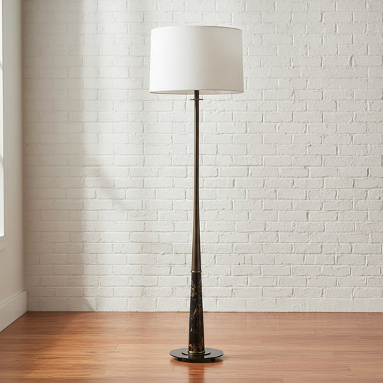 Floor lamp with a white shade