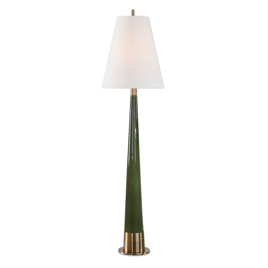 mid-century modern style table lamp with a tall, slender tapered ceramic body in a glossy moss green finish. The lamp features a brushed gold metallic base and matching neck hardware, topped with a crisp white tapered fabric drum shade