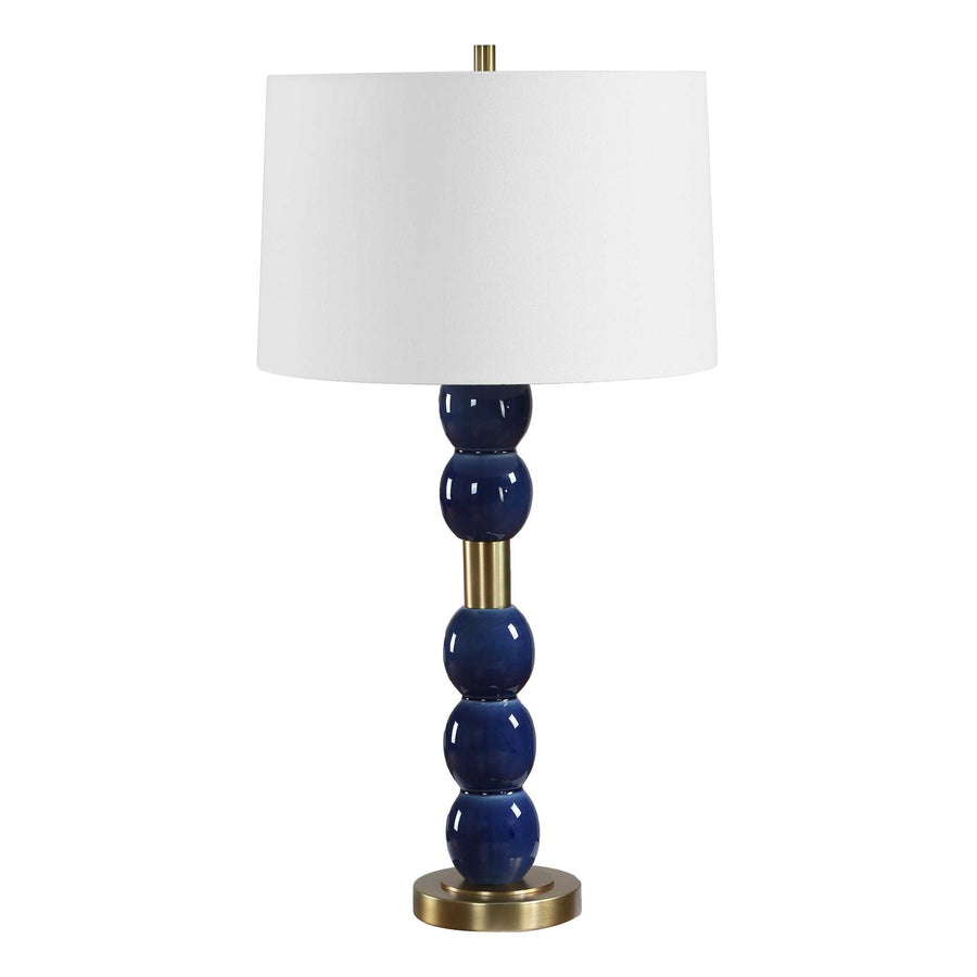 Table lamp with blue ceramic base and white shade