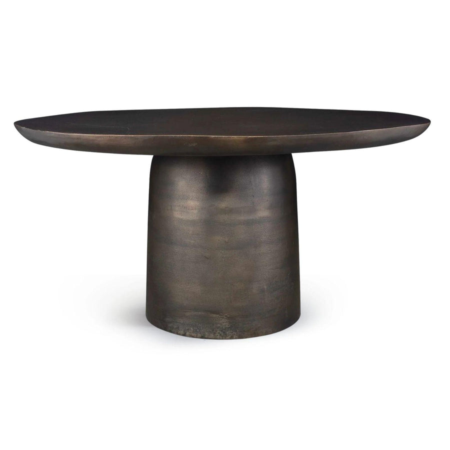 Bronze dining table with a round top and thick cylindrical base