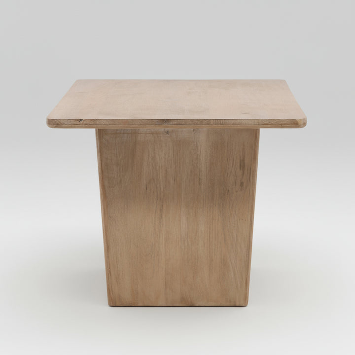 Wooden dining table on a white background