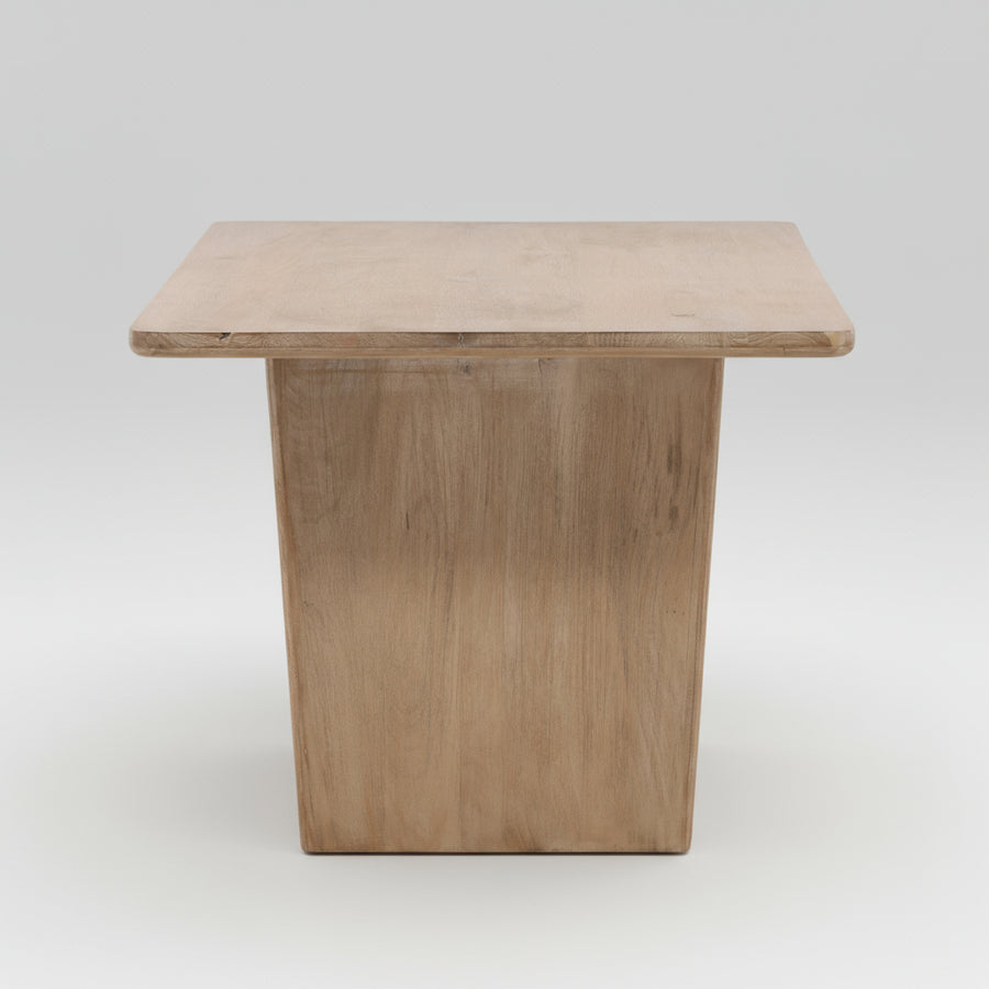 Wooden dining table on a white background