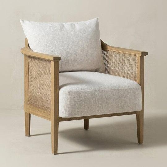 Chair with wooden frame and wicker backrest on a beige background