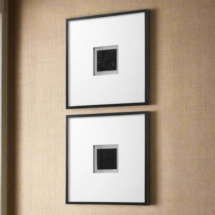 Two black-framed pictures