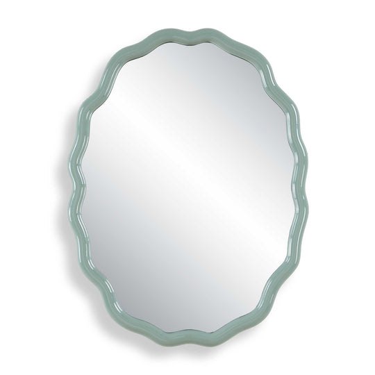 Oval mirror with a decorative blue-green frame on a white background