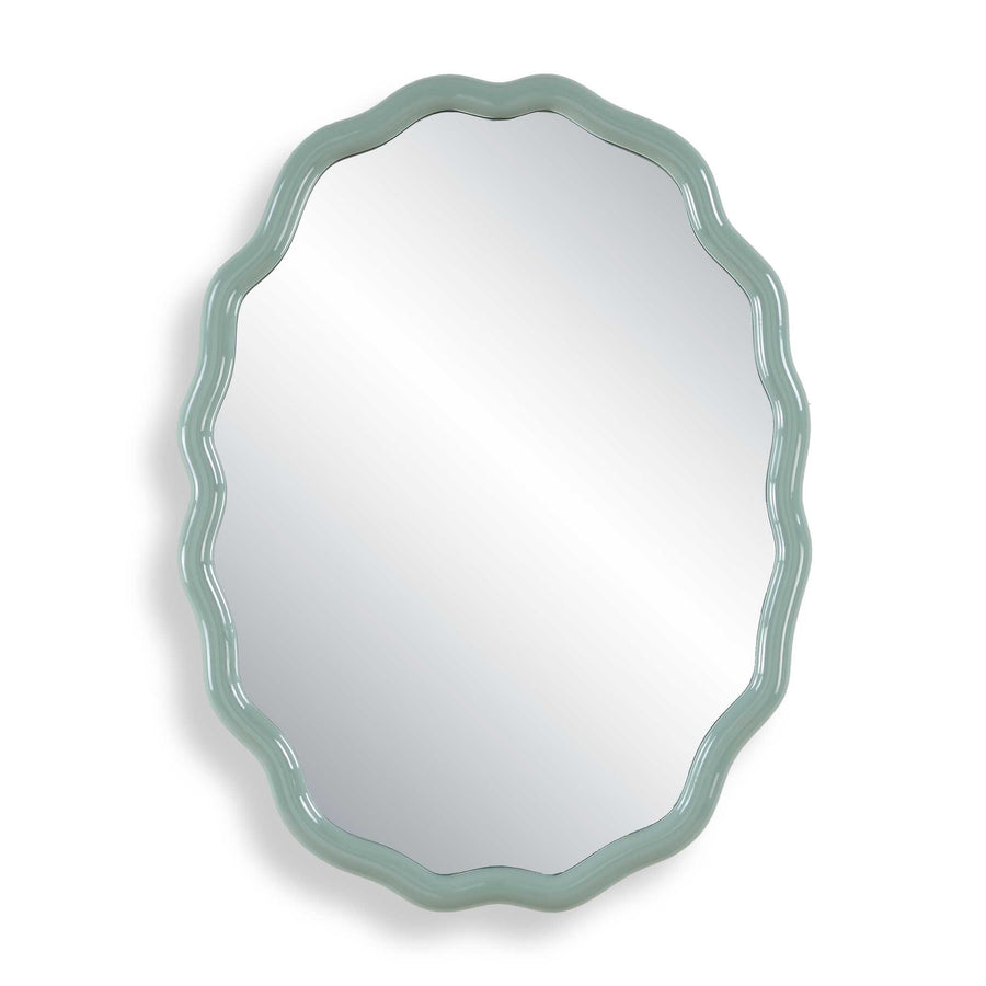 Oval mirror with a decorative blue-green frame on a white background