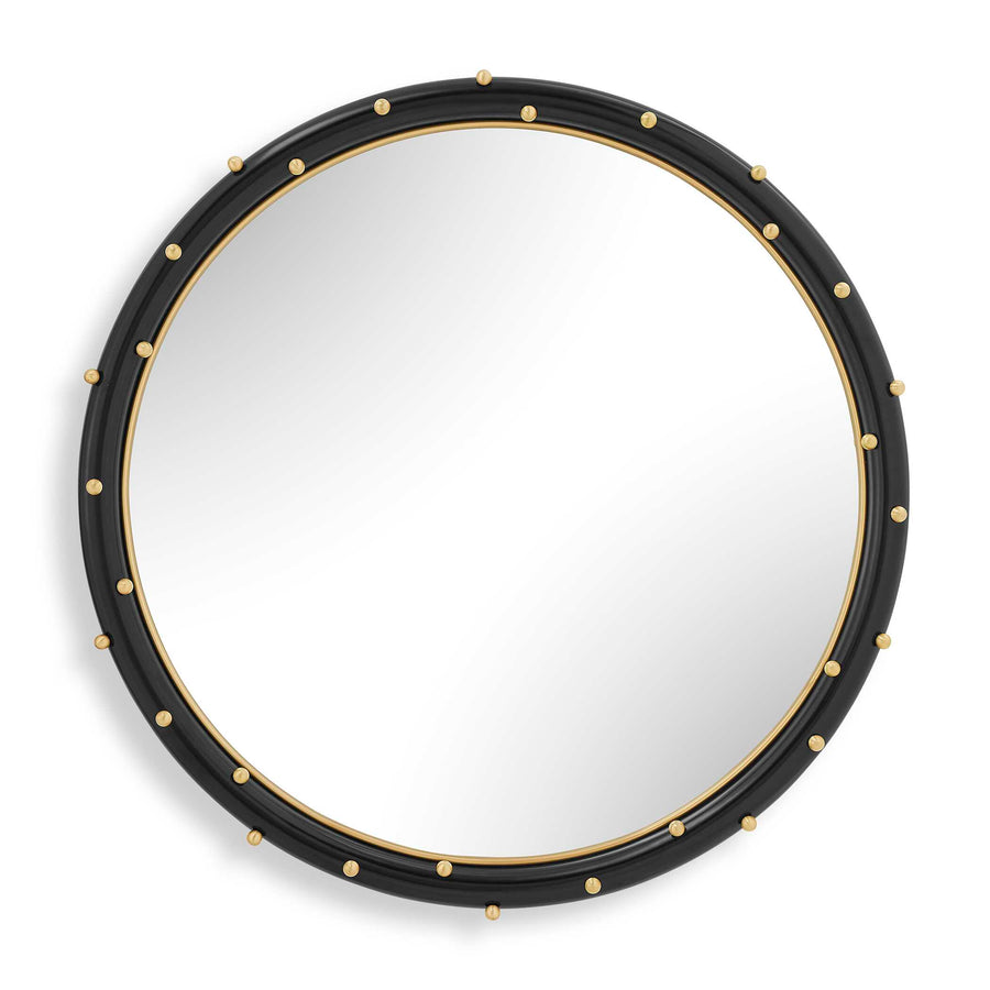 Round mirror with black frame and gold accents