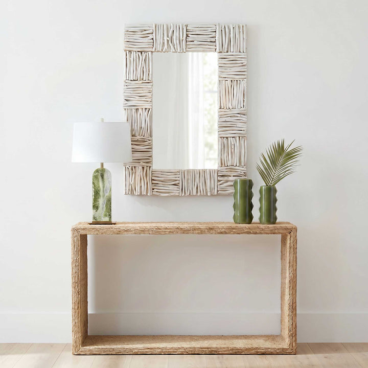 A rectangular wall mirror with a rustic, textured frame made of horizontal driftwood pieces painted in an off-white finish, isolated on a clean white wall.