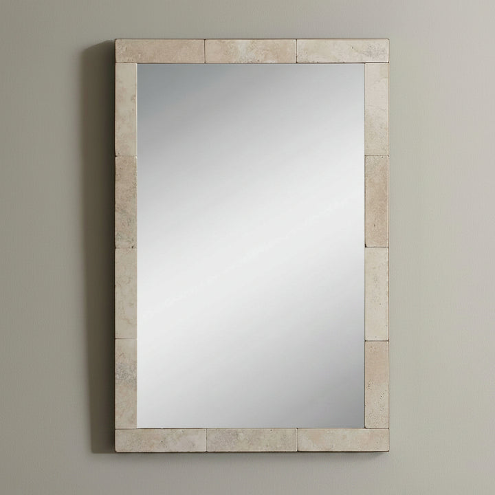 Decorative mirror isolated on a wall