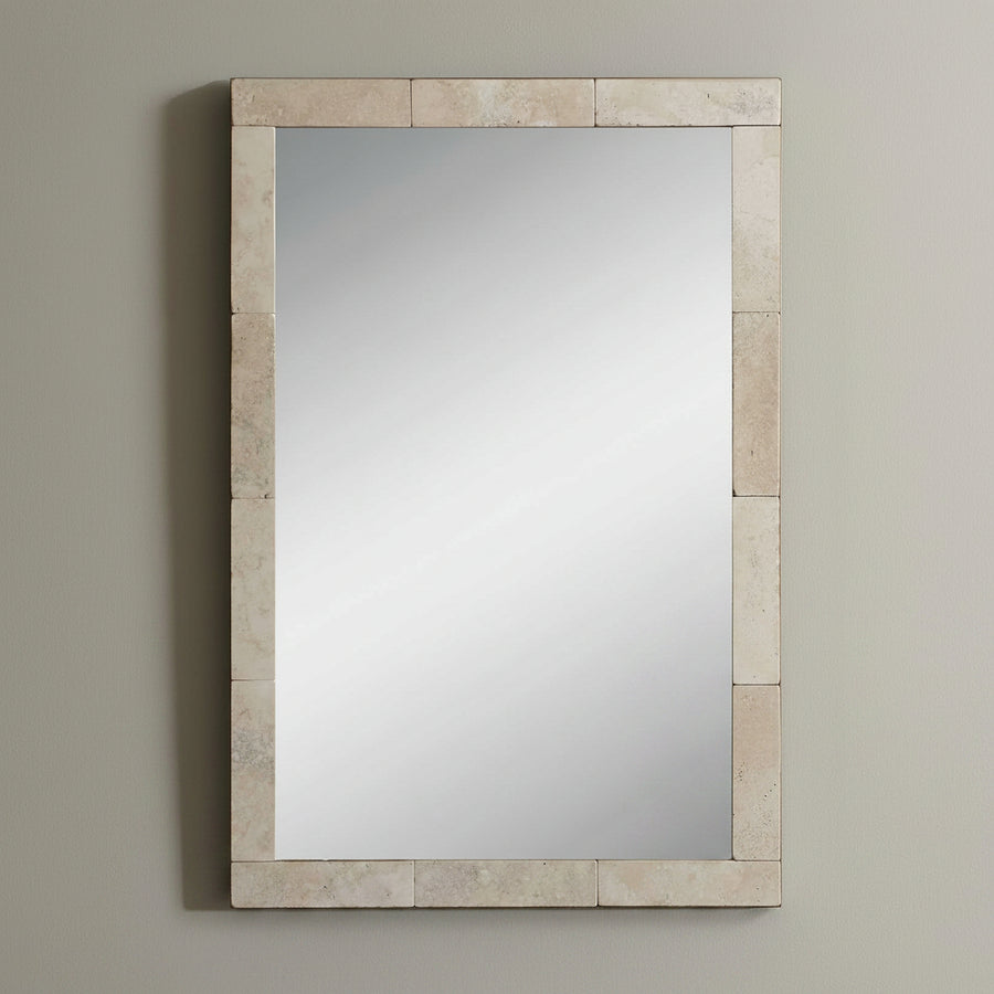 Decorative mirror isolated on a wall