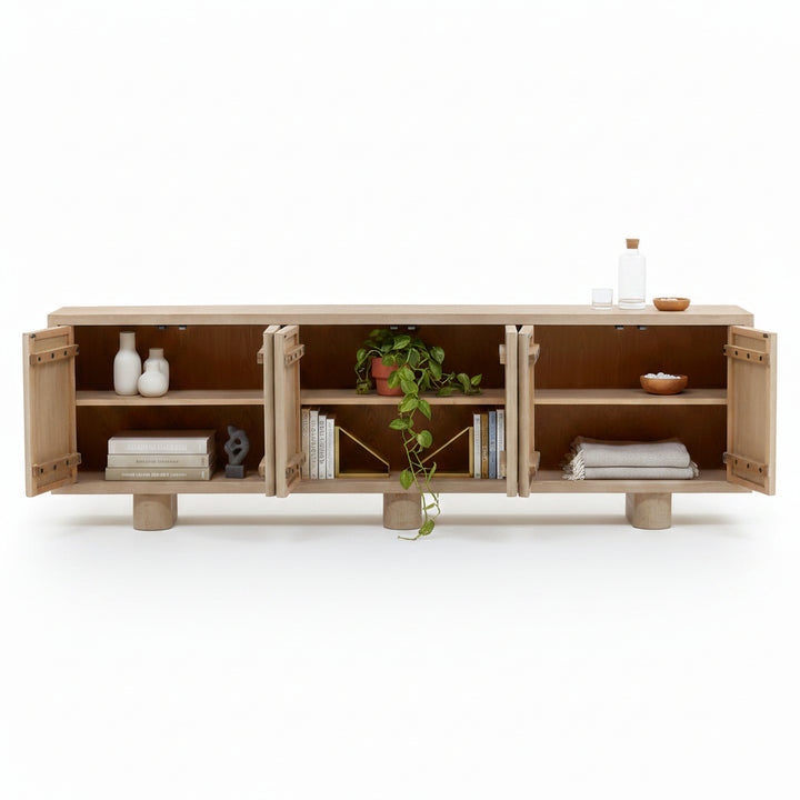 Wooden cabinet with open doors on a white background