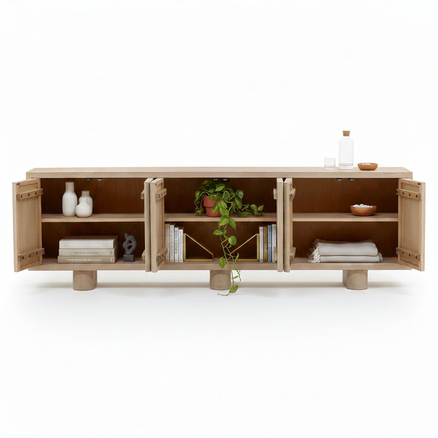 Wooden cabinet with open doors on a white background