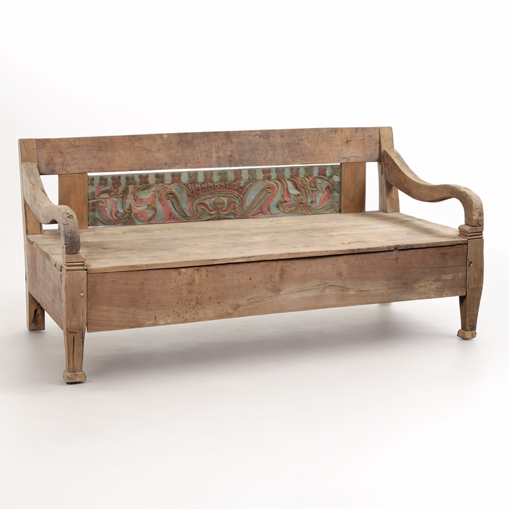 Wooden bench with a decorative backrest on a white background