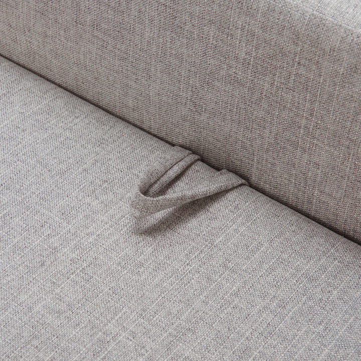 Close-up of a textured gray fabric surface