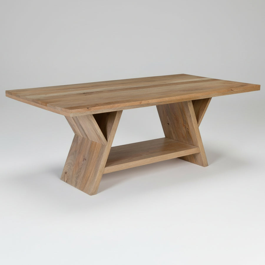 Wooden dining table with unique X-shaped legs on a white background