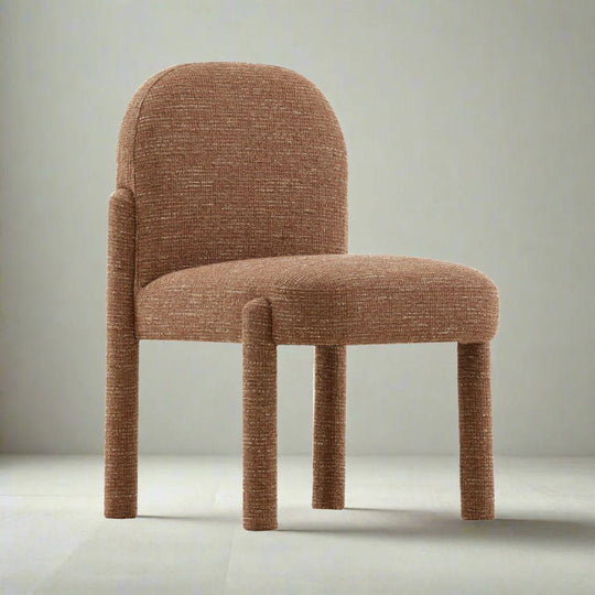 Brown textured chair on a light gray background