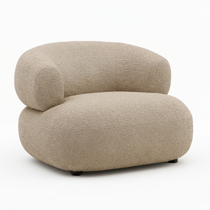 Beige armchair with a textured surface on a white background