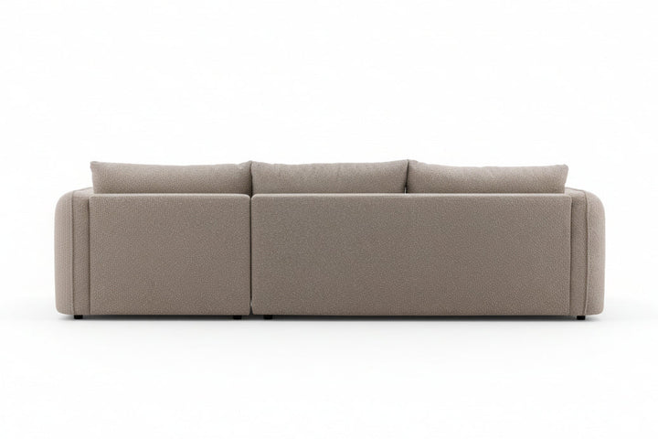 Beige sectional sofa on a white background