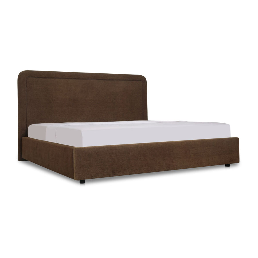 Brown upholstered bed