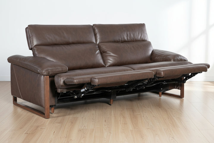 brown leather reclining sofa, two-seater, extended footrests, modern design, wooden legs, plush cushions, contemporary living room furniture, comfortable seating