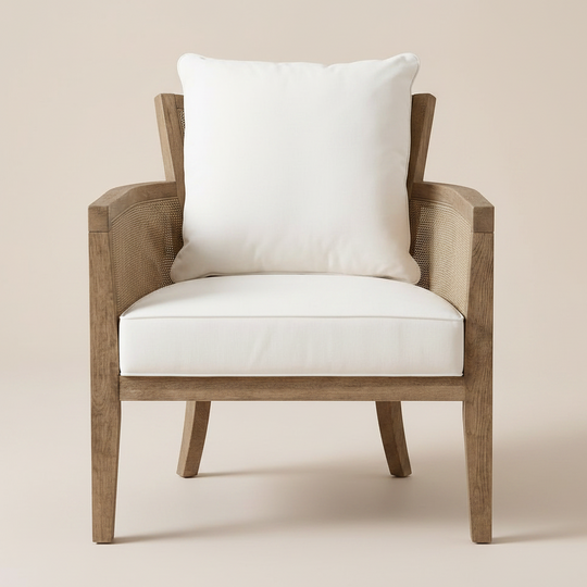 Wooden armchair with white cushion and pillow on a beige background