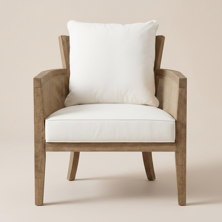 Wooden armchair with white cushion and pillow on a beige background