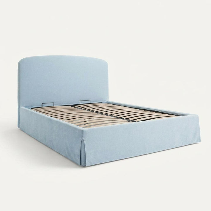 Light blue upholstered bed