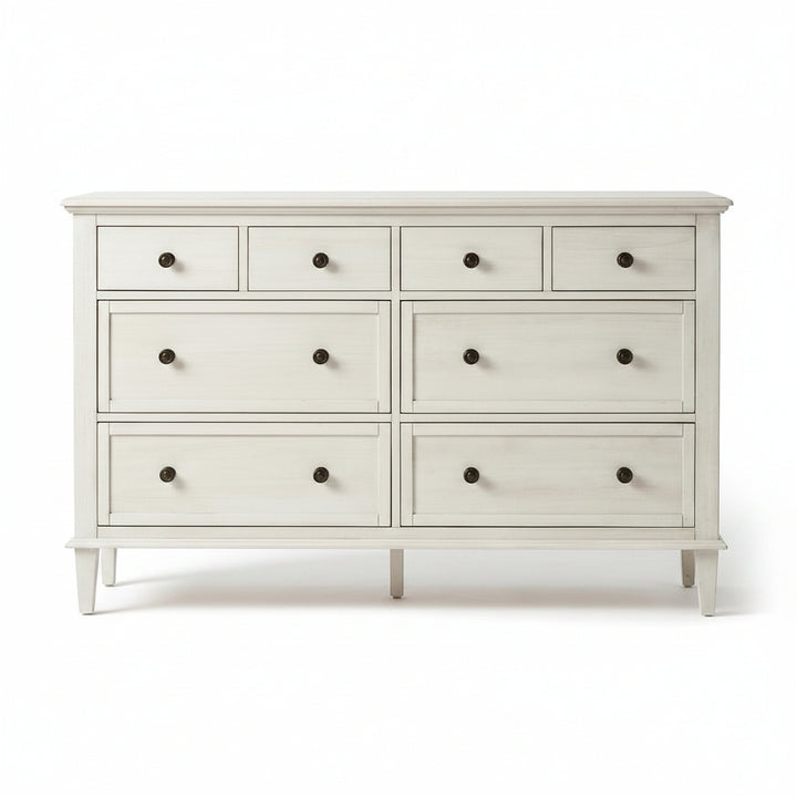 White dresser with multiple drawers on a white background