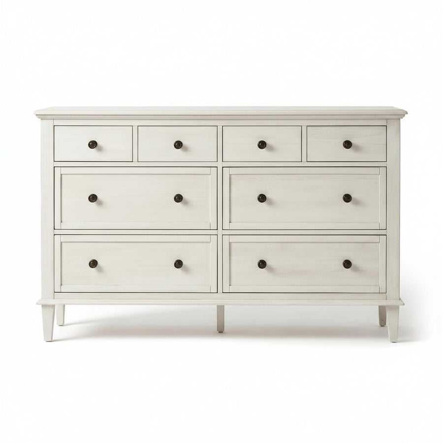 White dresser with multiple drawers on a white background