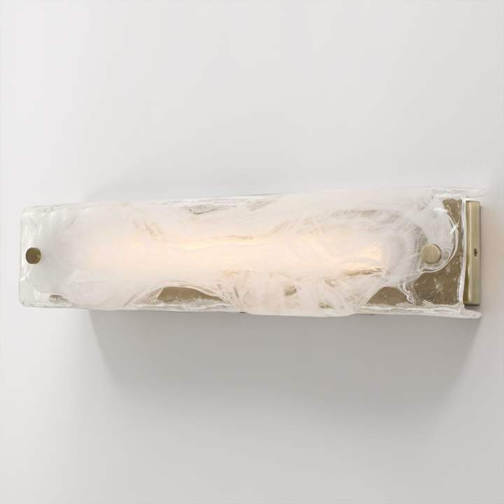 Wall-mounted light fixture with marble-like finish on a white background